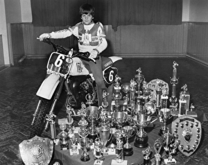 Young boy with all his trophies, West Country Young boy with all his trophies, West Country