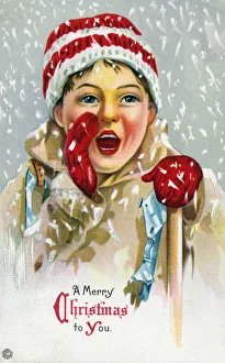 Young boy shouts out Merry Christmas through the snow Young boy shouts out Merry Christmas through the snow