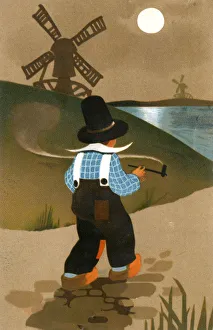 A Young Dutch boy in traditional costume, smoking a pipe A Young Dutch boy in traditional costume, smoking a pipe