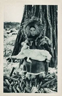 Young Eskimo (Inuit) girl with a captured Arctic Hare Young Eskimo (Inuit) girl with a captured Arctic Hare