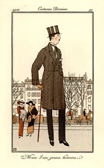 Young man in fashionable outfit with top hat and cane, 1912 Young man in fashionable outfit with top hat and cane, 1912