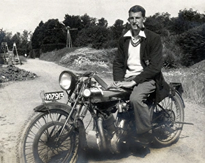 Young man on a special 1920s vintage motorcycle, early 193 Young man on a special 1920s vintage motorcycle, early 193