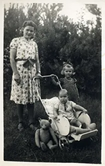 A young Mother with her two young children A young Mother with her two young children