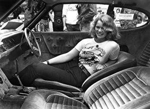 Young woman in Mustang at Custom Car Show Young woman in Mustang at Custom Car Show