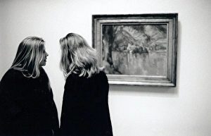 Two young women in an art gallery, London Two young women in an art gallery, London