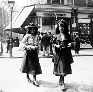 Two young women in Marylebone High Street, London Two young women in Marylebone High Street, London