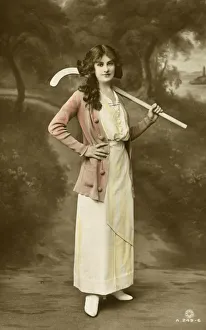 Youthful British Beauty holding her hockey stick Youthful British Beauty holding her hockey stick