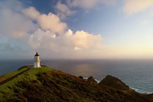 Cape Reinga - northernmost tip of New Zealand with Cape Reinga Lighthouse in first morning light Cape Reinga - northernmost tip of New Zealand with Cape Reinga Lighthouse in first morning light