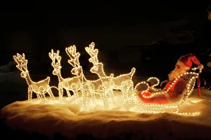 Christmas Decorations - illuminated reindeer & sleigh outside house Christmas Decorations - illuminated reindeer & sleigh outside house