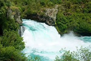 Huka Falls - water masses of Waikato river rushing down Huka Falls Huka Falls - water masses of Waikato river rushing down Huka Falls