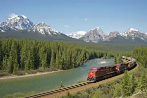 Morants Curve - Canadian Pacific Railway with Bow range of mountains in the background Morants Curve - Canadian Pacific Railway with Bow range of mountains in the background