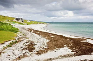Sandy beach and croft on Berneray (Bearnaraigh), with the Sound of Harris beyond, Outer Hebrides, Scotland, UK Sandy beach and croft on Berneray (Bearnaraigh), with the Sound of Harris beyond, Outer Hebrides, Scotland, UK