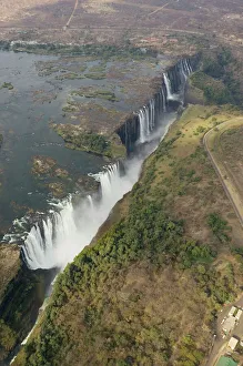 Zimbabwe / Zambia - Aerial view of the Zambezi River and the Victoria Falls (1700m wide) Zimbabwe / Zambia - Aerial view of the Zambezi River and the Victoria Falls (1700m wide)