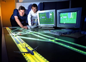 Prints of Airfield lighting simulation. Researchers testing an embedded computer system that operates lights in a model airfield Images Dated 2003 August: Airfield Lighting Simulation Print