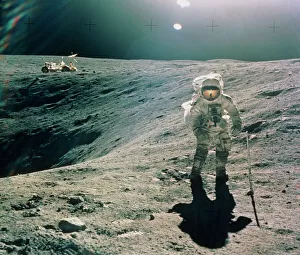 Astronaut Duke next to Plum Crater, Apollo 16 Astronaut Duke next to Plum Crater, Apollo 16