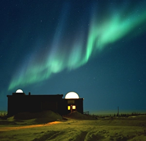 Aurora borealis over observation domes in Canada Aurora borealis over observation domes in Canada