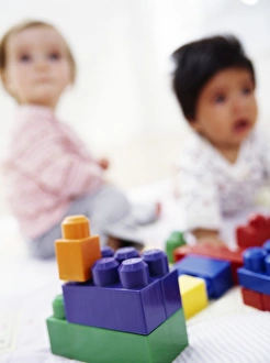 Childhood Toy Photography Prints: Babies with building blocks