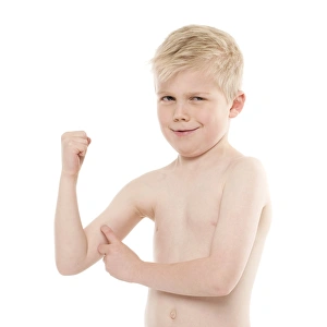 Boy flexing his biceps Print