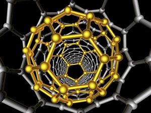Carbon nanotube and buckyball, artwork Carbon nanotube and buckyball, artwork
