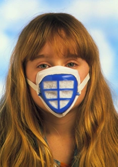 Child wears mask to protect against air pollution Child wears mask to protect against air pollution