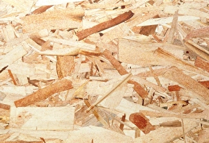Close-up of the surface of a sheet of hardboard Close-up of the surface of a sheet of hardboard