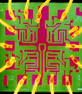 Coloured SEM of a 7401 TTL integrated circuit Coloured SEM of a 7401 TTL integrated circuit