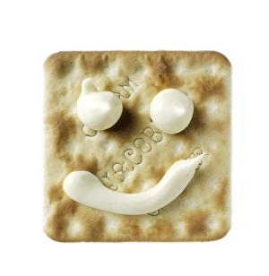 Prints of Cracker, with a smiley face drawn in cheese Images Dated 2008 October: Cracker with Smiley Face in Cheese Print