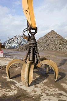 Prints of Crane grabber claw. This device is electromagnetic, which enables it to separate and lift ferrous metals (iron and steel). Photographed at a recycling depot in Southampton Docks, UK Images Dated 2008 April: Electromagnetic Crane Grabber Claw Print