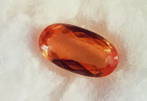 Cut and polished crystal of imperial topaz Cut and polished crystal of imperial topaz