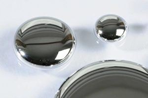 Prints of Drops of liquid mercury on a hard surface. Mercury has a very low melting point and is the only metal that is liquid at standard room temperature and pressure Images Dated 2010 November: Liquid Mercury Droplets Print