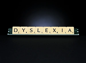 Prints of Dyslexia. Scrabble letters spelling the word dyslexia. Dyslexia is a congenital and developmental disorder affecting a persons ability to read and write Images Dated 2005 September: Print of Dyslexia letters, a visual representation of the word