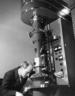 Prints of Early electron microscope being operated by a researcher Images Dated 2008 September: Early Electron Microscope Print