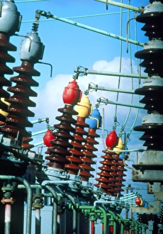 Electrical insulators and cables at power station Electrical insulators and cables at power station