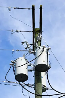 Prints of Electricity pole. Close-up of an electric power line pole with pole-mounted transformers. Photographed in Cocoa, Florida, USA Images Dated 2009 September: Electricity pole Print with transformers