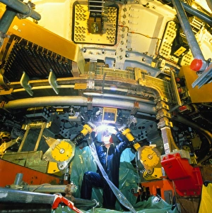 Engineer working on tokamak fusion reactor at JET Engineer working on tokamak fusion reactor at JET