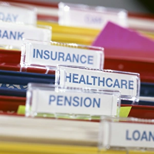 Prints of Financial plans. Conceptual image of labels in a filing cabinet, representing plans and paperwork for financial affairs Images Dated 2004 July: Financial Plans Print