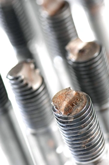 Prints of Fractured bolts. Close-up of the ends of a number of threaded steel rods, showing where they have snapped, due to the application of excessive stress Images Dated 2008 December: Fractured Bolts Print - Close-up of Threaded Rod Ends