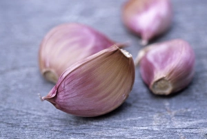 Wooden Surface Still Life Prints: Garlic cloves