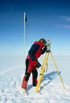 Images Dated 15th December 1993: Glaciologist using theodolite on Ronne Ice Shelf