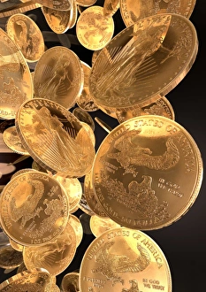 Prints of Gold coins. Computer artwork of an abundance of 50 dollar American Gold Eagle coins. The United States of America started issuing gold American Eagles in 1986 Images Dated 2008 April: Gold Coins Print - American Eagle Coin Collection