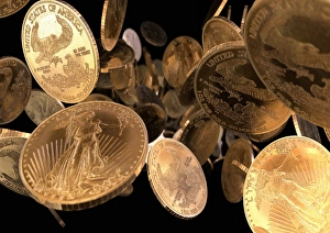 Prints of Gold coins. Computer artwork of an abundance of 50 dollar American Gold Eagle coins. The United States of America started issuing gold American Eagles in 1986 Images Dated 2008 April: Gold Coins Print - 50 Dollar American Eagle Computer Artwork