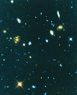 Images Dated 1995: True Colour Hubble Space Telescope Print of Distant Irregular Blue Galaxies