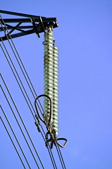 Prints of Insulators on an electricity pylon. These prevent electricity passing through to the metal frame of the pylon Images Dated 2006 August: Electricity Pylon Insulators Print