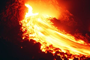 Prints of Lava flow. Night time view of lava flowing from a small vent on Etna. This vent is a hornito, a relatively small outlet which is normally only throws out lava bombs Images Dated 2000 October: Print of lava flowing from a small vent on Mount Etna