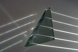Prints of Light rays and triangular prism. As light rays pass between transparent materials of different densities, they will bend (be refracted) at the boundary Images Dated 2013 January: Light Rays Refracted Through a Glass Prism Print