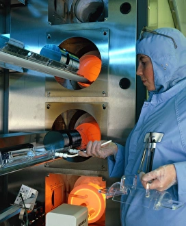 Loading of silicon wafers into high temp. furnace Loading of silicon wafers into high temp. furnace