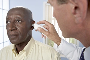Healthcare Professional Checkup Prints: Measuring ear temperature