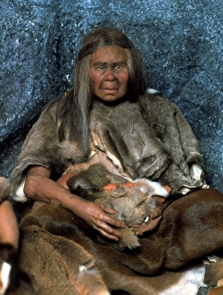 Model of a neanderthal woman holding a baby Model of a neanderthal woman holding a baby