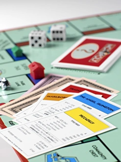 Prints of Monopoly board game. This game was developed in 1934 by an American, Mr Charles Darrow. Today, Monopoly is the best-selling board game in the world, produced in 26 languages and sold in 80 countries Images Dated 2005 January: Print of a Monopoly game board