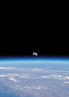 Earth From Space Prints: Moonrise over Earth